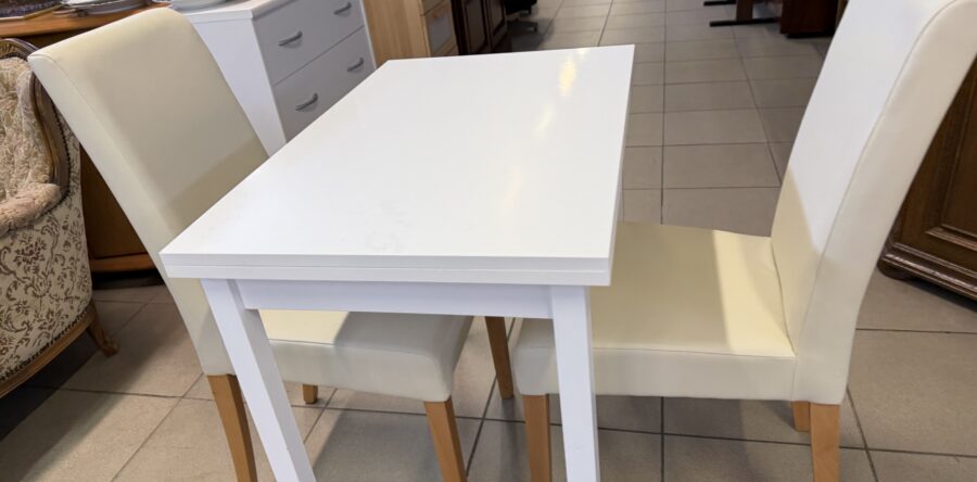886 nový jídelní stůl rozkl. s dvěma židlemi,85x55x75cm,po rozl.135cm,cena 3470Kč